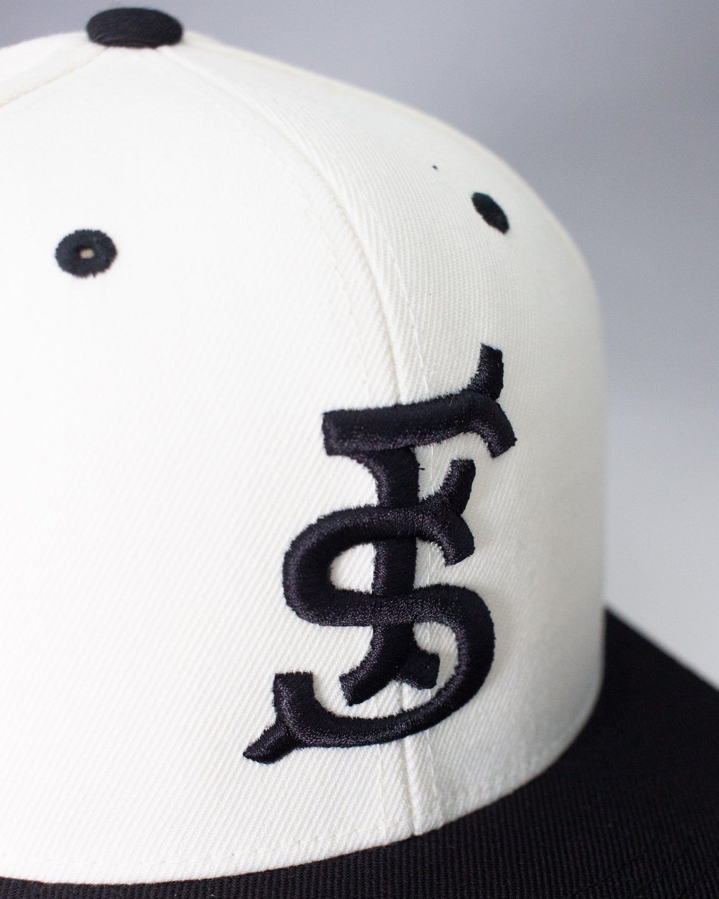 Fieldschool Sports Monogram Snapback Hat in Cream and Black