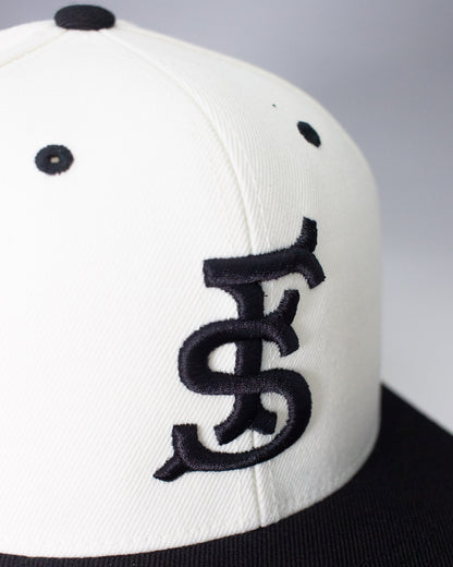 Fieldschool Sports Monogram Snapback Hat in Cream and Black