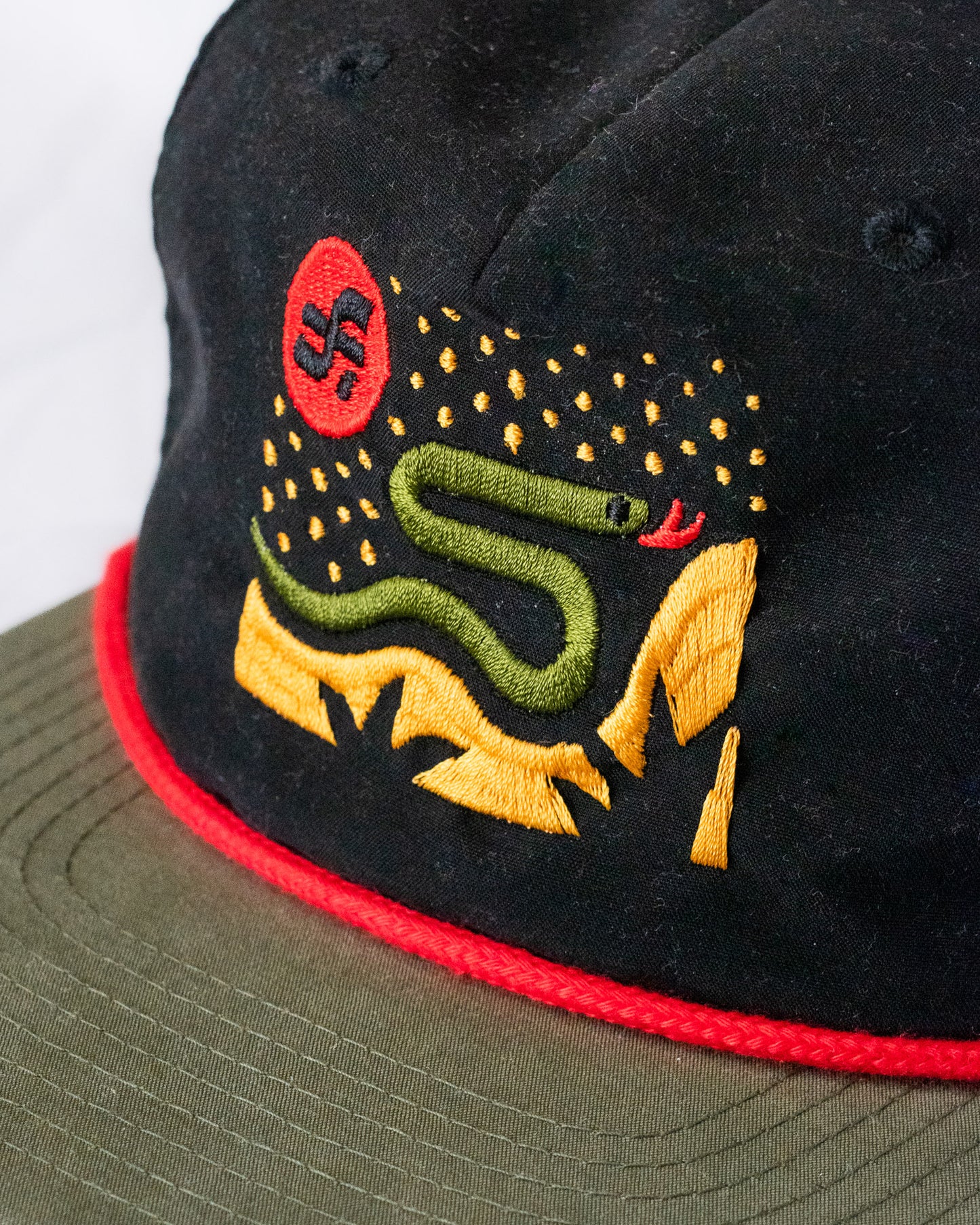 Desert Snake Cap in Black, Green and Red